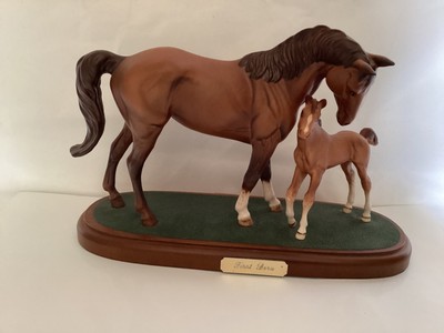 ROYAL DOULTON FIRST BORN AND FOAL ON WOODEN PLINTH