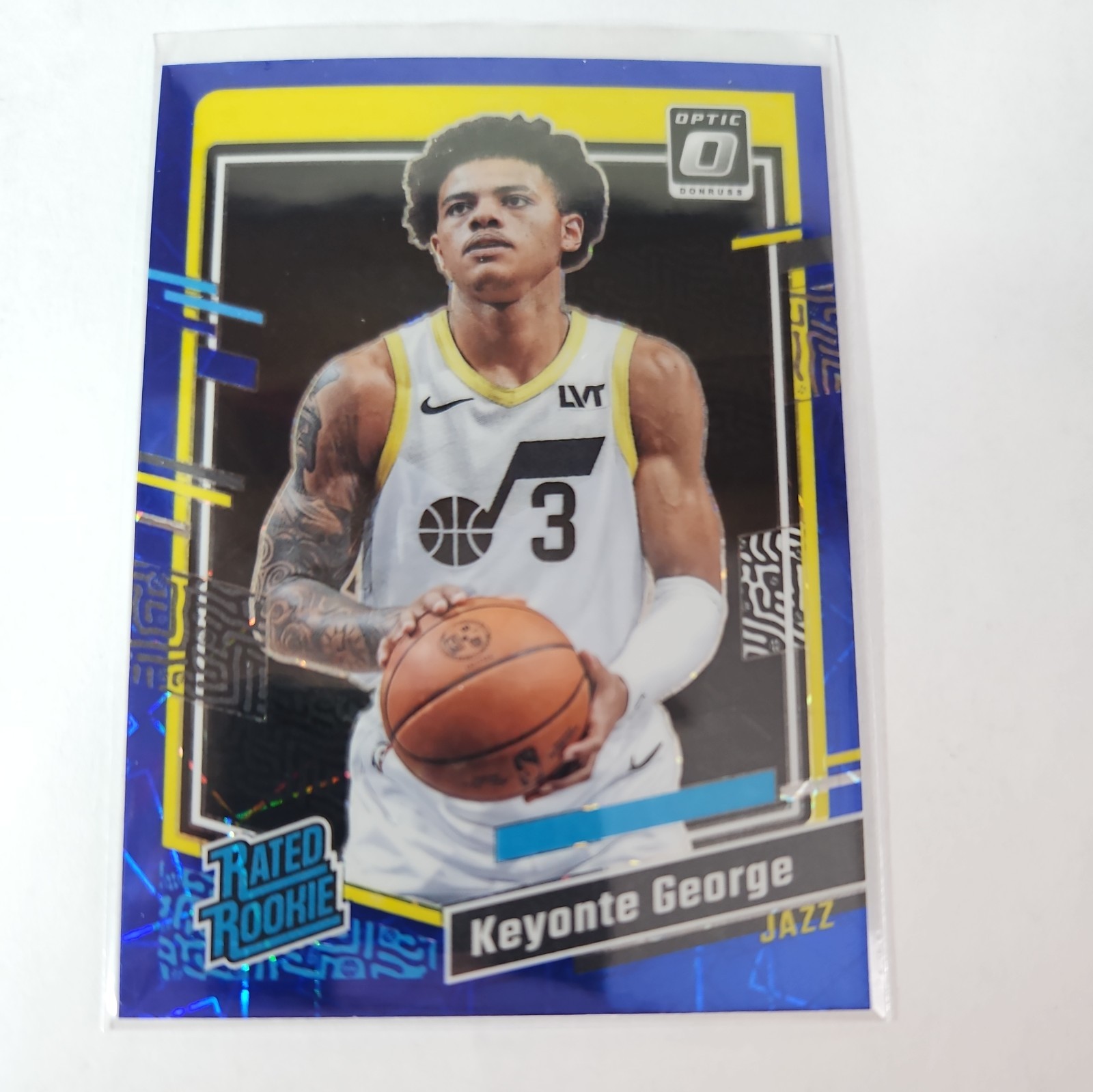 2023-24 Panini Donruss Optic - Keyonte George #223 Blue Velocity RC Jazz Rookie
