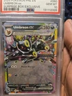 2025 Pokemon Umbreon Ex Surprise Box 060/131 Prismatic Evolutions Stamp - PSA 10