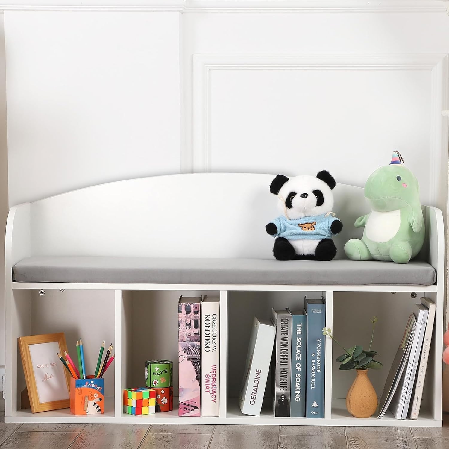 Libreria per bambini con angolo lettura e cuscino