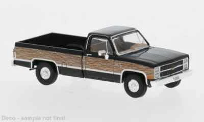 Brekina 19658 1:87 H0 Chevrolet C 10 schwarz, Woody 1982 NEU OVP - Bild 1 von 2