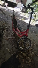 (2) ElliptiGO 8speed (1) Black and (1) Red Stand Up Bike Condition USED (AS IS)