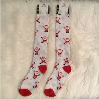 Claire s Santa & Snowflake themed knee socks sold as a set of two pair