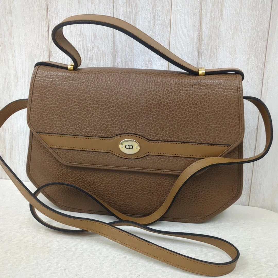 Sac bandoulière rabat Christian Dior cuir marron fabriqué en France utilisé du Japon