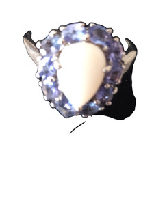 Pear Shaped White Ethiopian Opal with Natural Tanzanite size 10