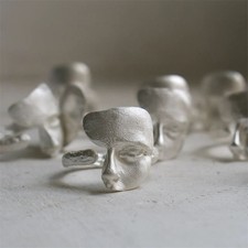 Handcrafted open-ended silver mask ring, fros...