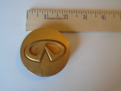 NISSAN 40343 5P215 OEM Center Wheel Hub Cap gold in color