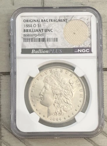 1884 o Morgan Silver Dollar NGC Brilliant Uncirculated $1 original bag fragment