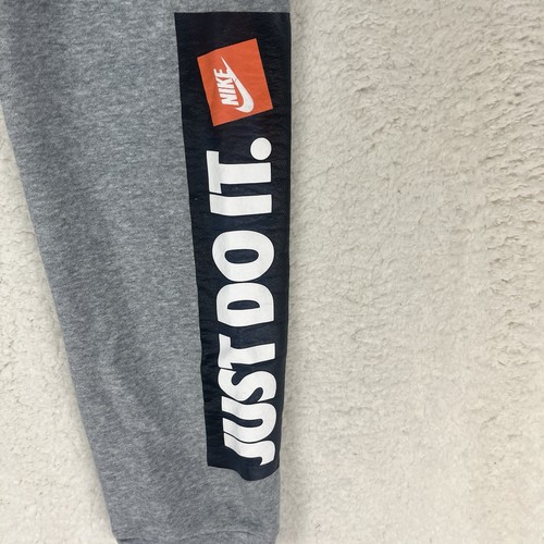 Petit pantalon de survêtement conique gris homme Nike Sportswear polaire Just Do It - Photo 2/7
