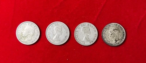 4 older  Canadian Silver Quarters Good condition
