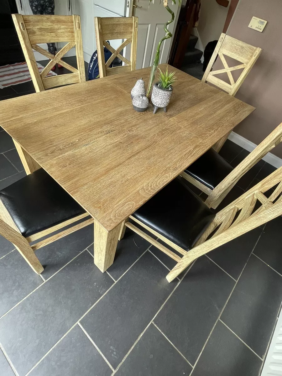 Second hand solid wood dining deals table