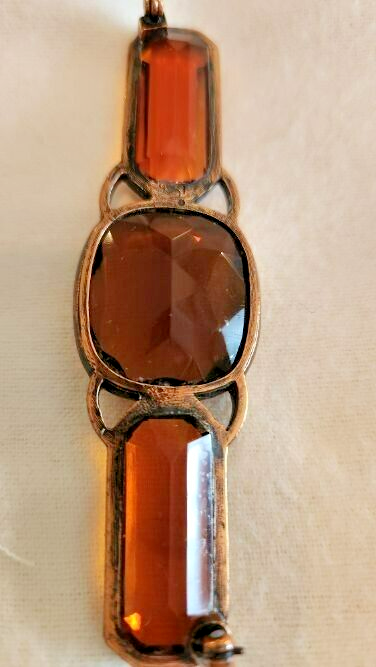 Yves Saint Laurent brooch copper clad medal and smokey topaz Yves Saint Laurent brooch copper clad medal and smokey topaz