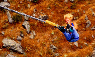 French actress and dancer Marlene Mourreau doing bungee jumping, 1- Old Photo 1