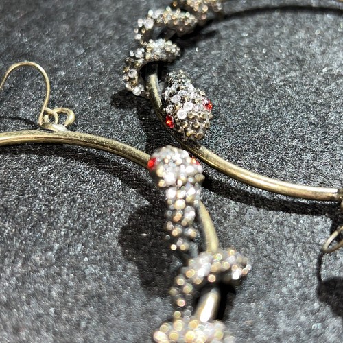 coiled red eyed snake earrings 2” goldtone hoops