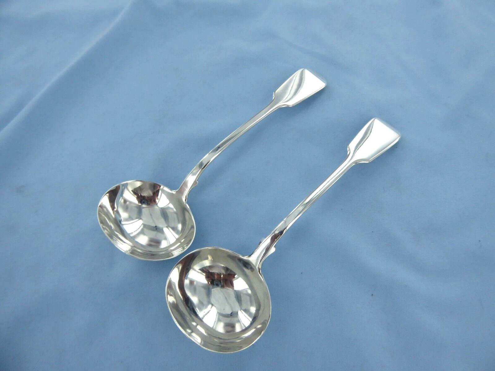 AN ANTIQUE PAIR OF STERLING SILVER FIDDLE BACK,SAUCE LADLES LONDON 1844.
Opens in a new window or ta