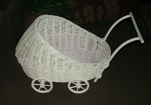 white wicker doll carriage