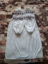 Embroidered folk women's shirt. Ethnic shirt made of homespun fabric.