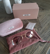 SONNENBRILLE VON( MIU MIU) ROSA GLÄSER GOLDE...