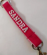 Sandra Namesake Pink White Strap Wristlet Keyring