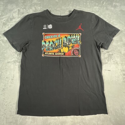 peach and black nike shirt