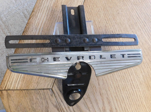 1940's  CHEVROLET LICENSE PLATE LAMP ASSEMBLY Original GM Guide & Chrome Emblem.