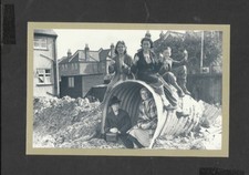 Nostalgia Postcard  London family outside their ruined Anderson shelter   1940