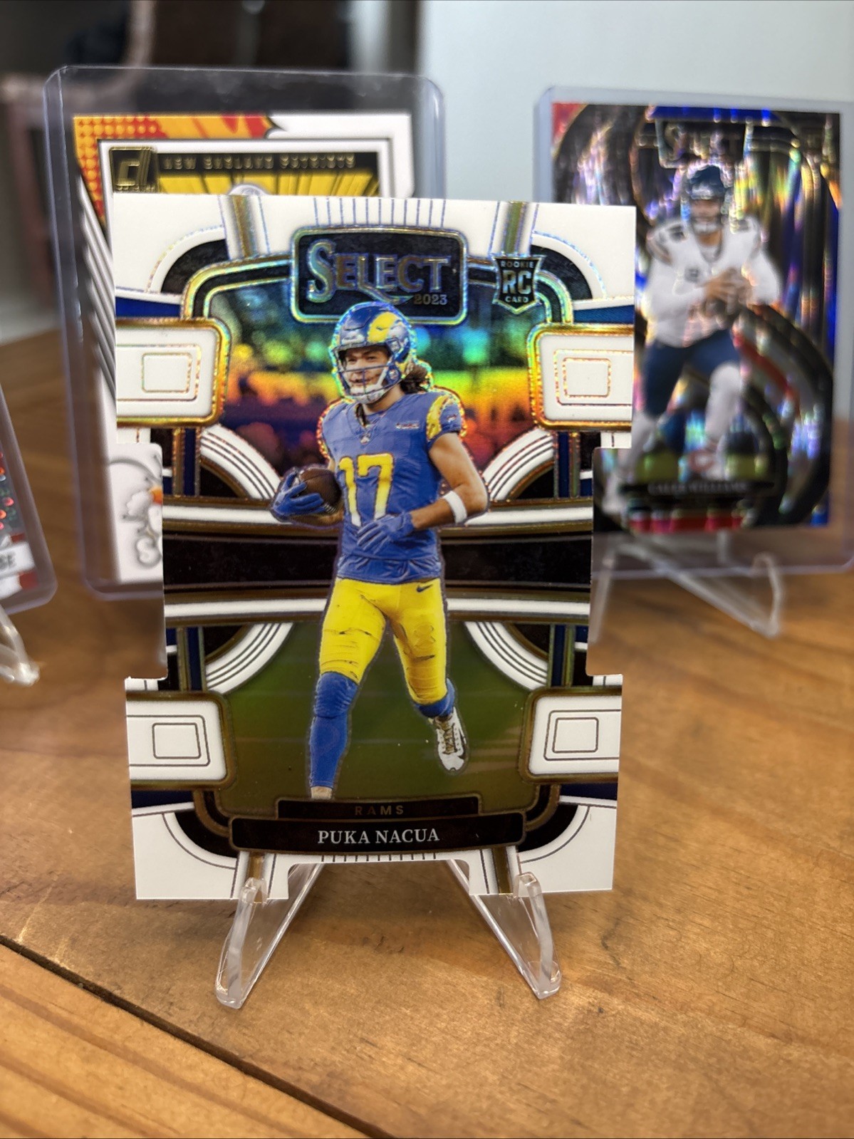 2023 Panini Select - Concourse Puka Nacua #56 White Prizm Die-Cut /199 (RC)
