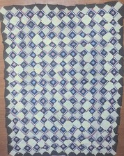 34 1/2" x 43 1/2" vintage baby quilt with abc pieces in a trip around the world