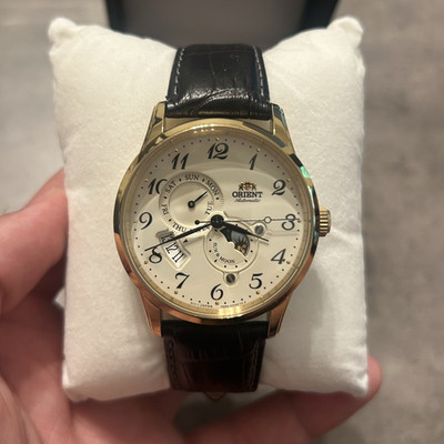 Orient Sun & Moon Automatic 42mm Gold Case White Dial Black Leather Strap