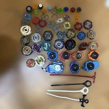 Beyblade Lot - Assorted Beyblades, Spin Launchers & Parts - Multicolor