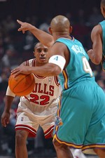 Jay Williams Chicago Bulls concentrates as David Wesley New Orlea- 2002 Photo