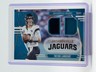 TREVOR LAWRENCE 2025 ABSOLUTE TOOLS OF TRADE DUAL JERSEY PATCH /249 Q6084