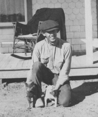 Man With Kitten Puppy Cat Small Dog Sitting On Porch Front Yard Scene 1930s