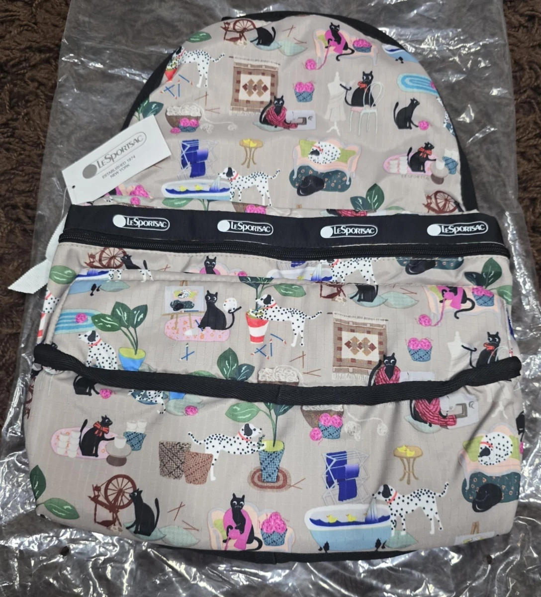 LeSportSac crafty pets backpack New with tags Cat & Dog factory sealed  Lesportsac | Bags | Lesportsac Multicolor Cat And Dog Print  main image 4