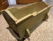 Hand-made solid wood children’s toy cradle for dolls and play