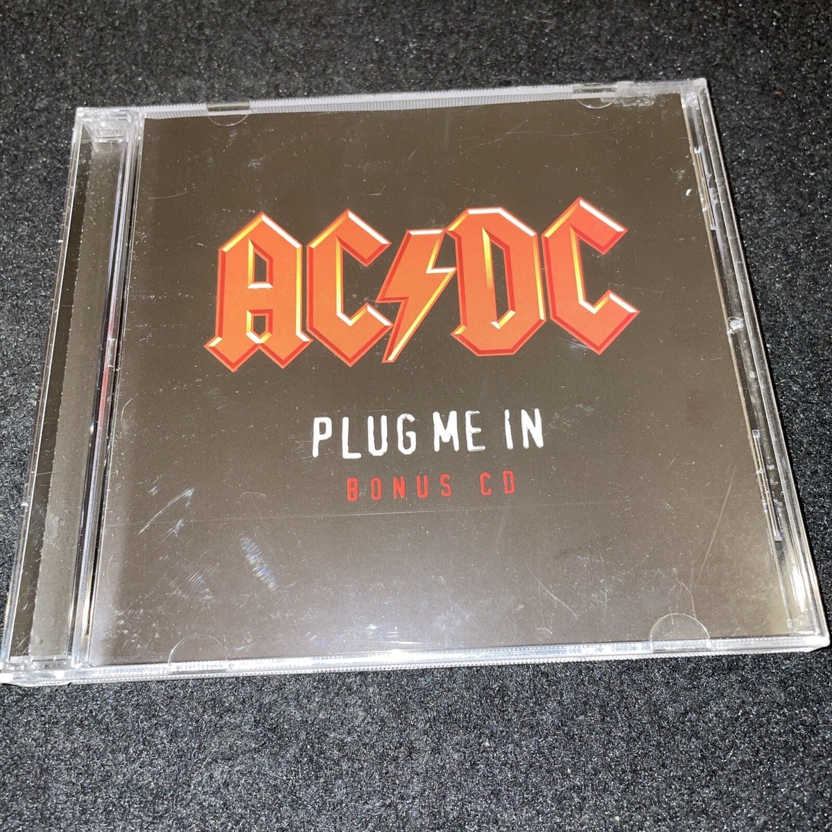 AC/DC Plug Me In 2DVD Set + 3 Track Bonus CD 886971041798| eBay