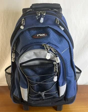 CALPAK Soft Sided Blue 18" Rolling Carry On Backpack 6 Compartment Luggage EUC