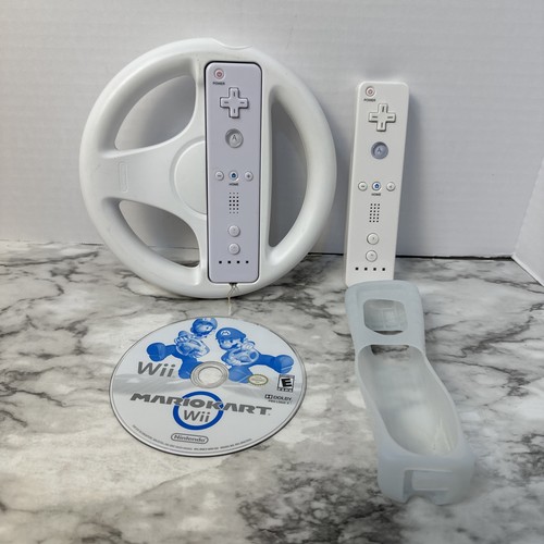 Wii Mario Kart gioco con ruota e controller.