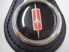 OLDSMOBILE  RED ROCKET  BLACK BACKGROUND  KEY CHAIN   LEATHER FOB  FREE POSTAGE