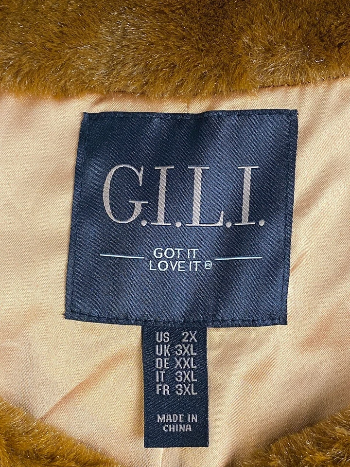 Jaqueta feminina de pele sintética G.I.L.I plus 2X manga pulseira forrada marrom raposa QVC - Imagem 3 de 4