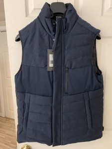 tumi down vest