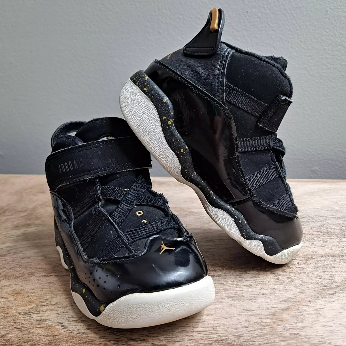 Jordan 6 rings top black metallic gold white