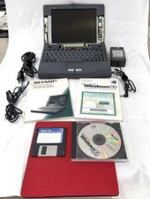 Vintage Sharp PC-3010 Notebook Computer Laptop For Parts or Repair extras AS IS
