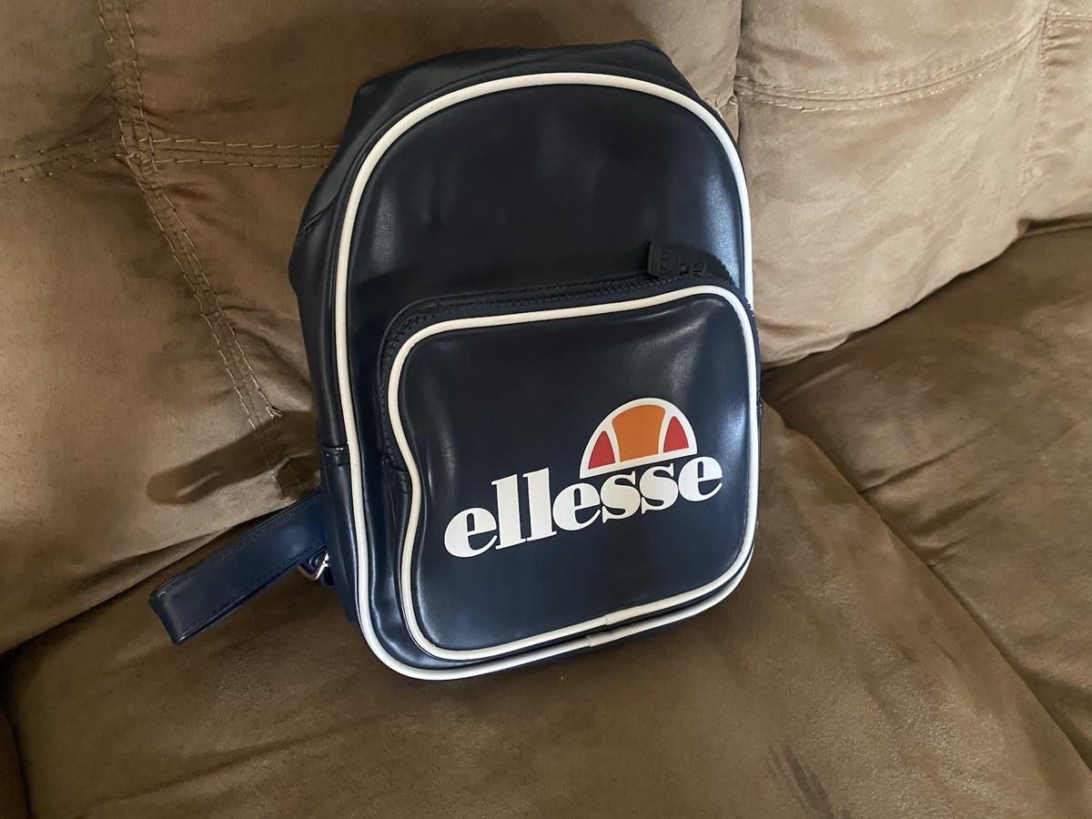 backpack for traveling carryon Versapack+ Carry-on Spinner / Travelpro® Altitude™ Large Set Rod color:Arctic Blue Three additional front pockets 2 weight fly rod Six Outstanding Freshwater Reels
