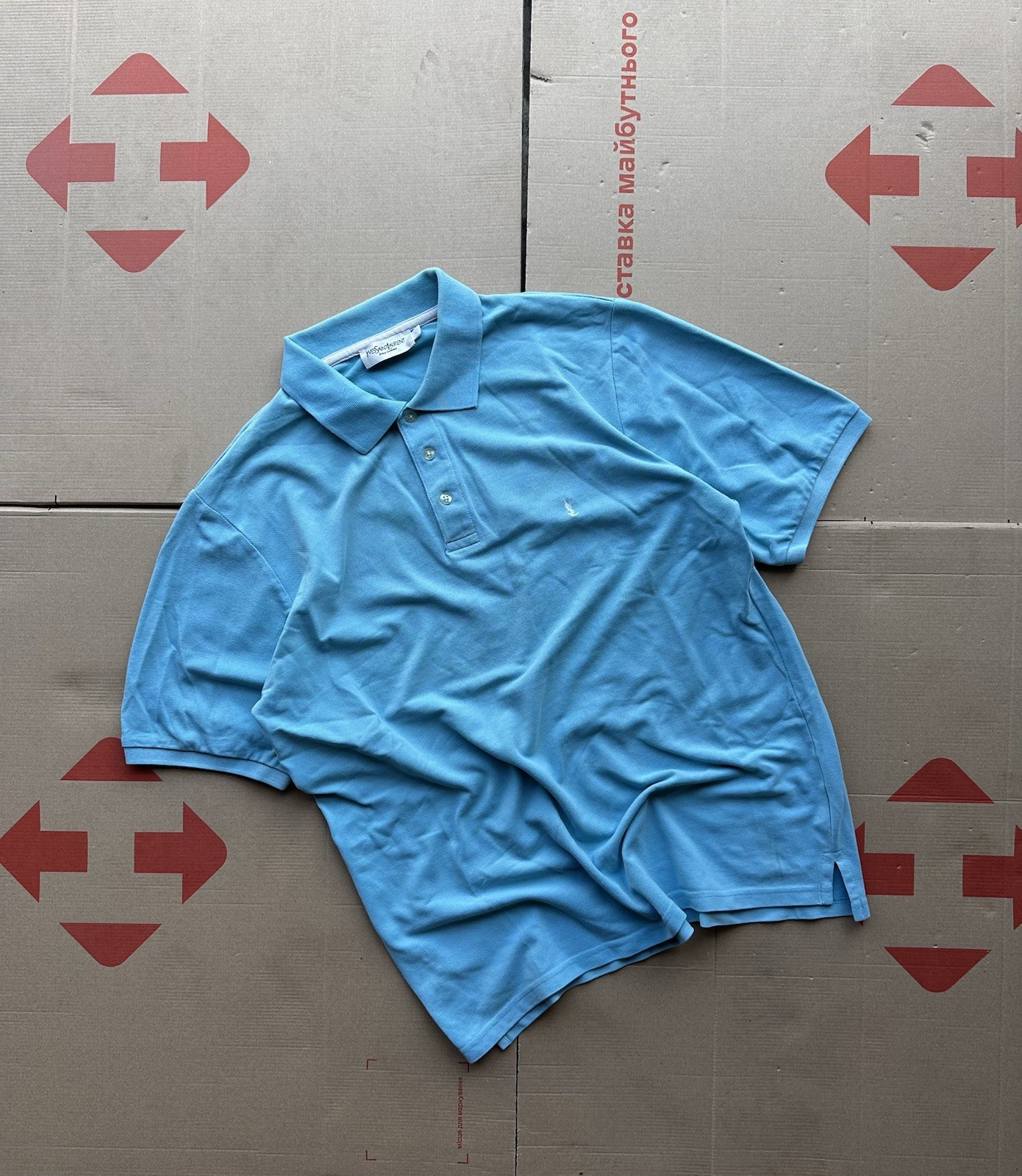 Polo Yves Saint Laurent L blu con logo ricamato YSL