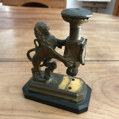 sculpture N123 office object stamp? bronze lion