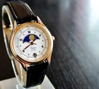 VINTAGE TIMEX DATE ELEGANT MOON PHASE QUARTZ WOMEN'S GOLDEN BLACK LIZARD WATCH