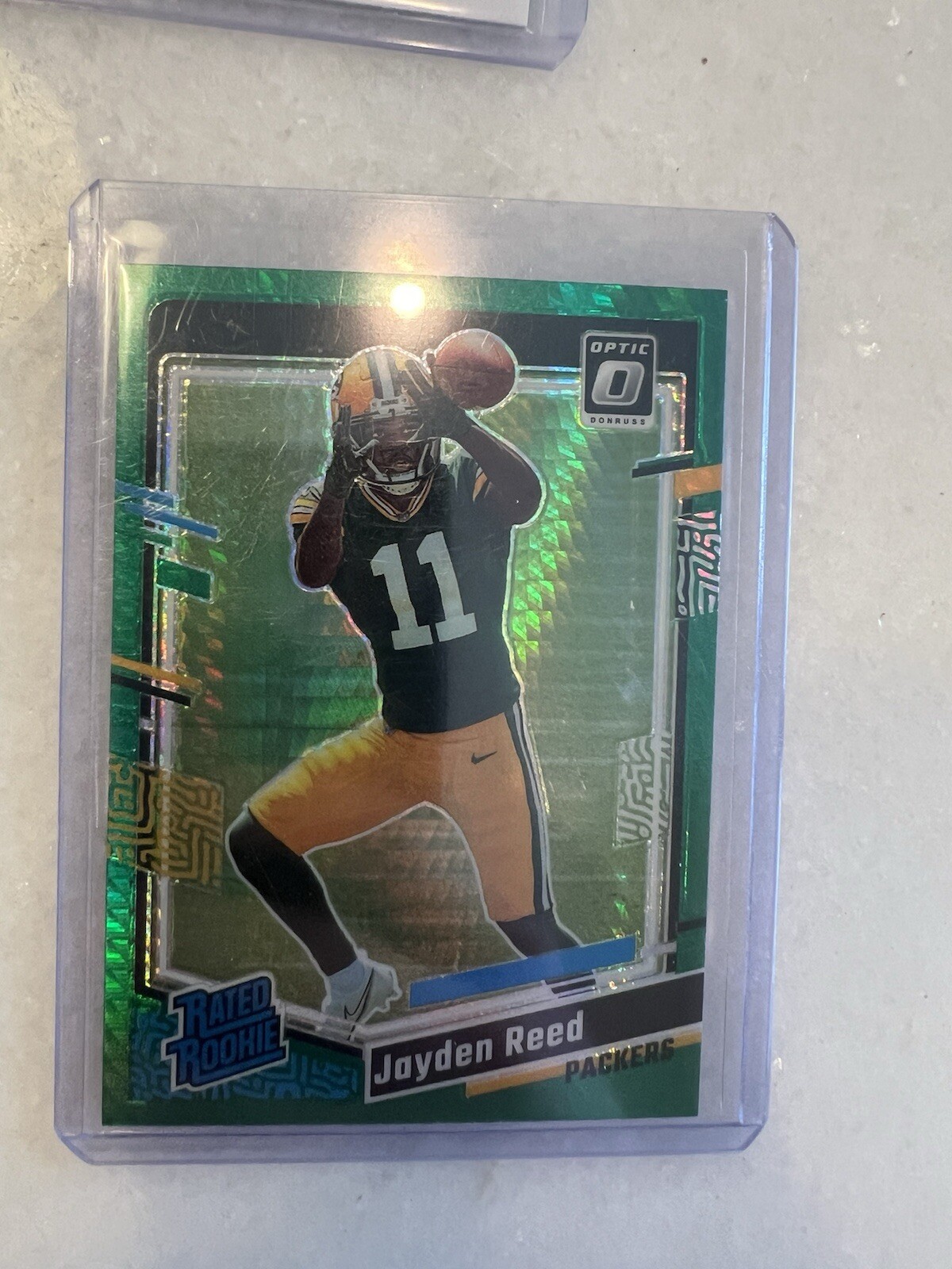 2023 Panini Donruss Optic - Rated Rookie Green Hyper Prizm #239 Jayden Reed (RC)