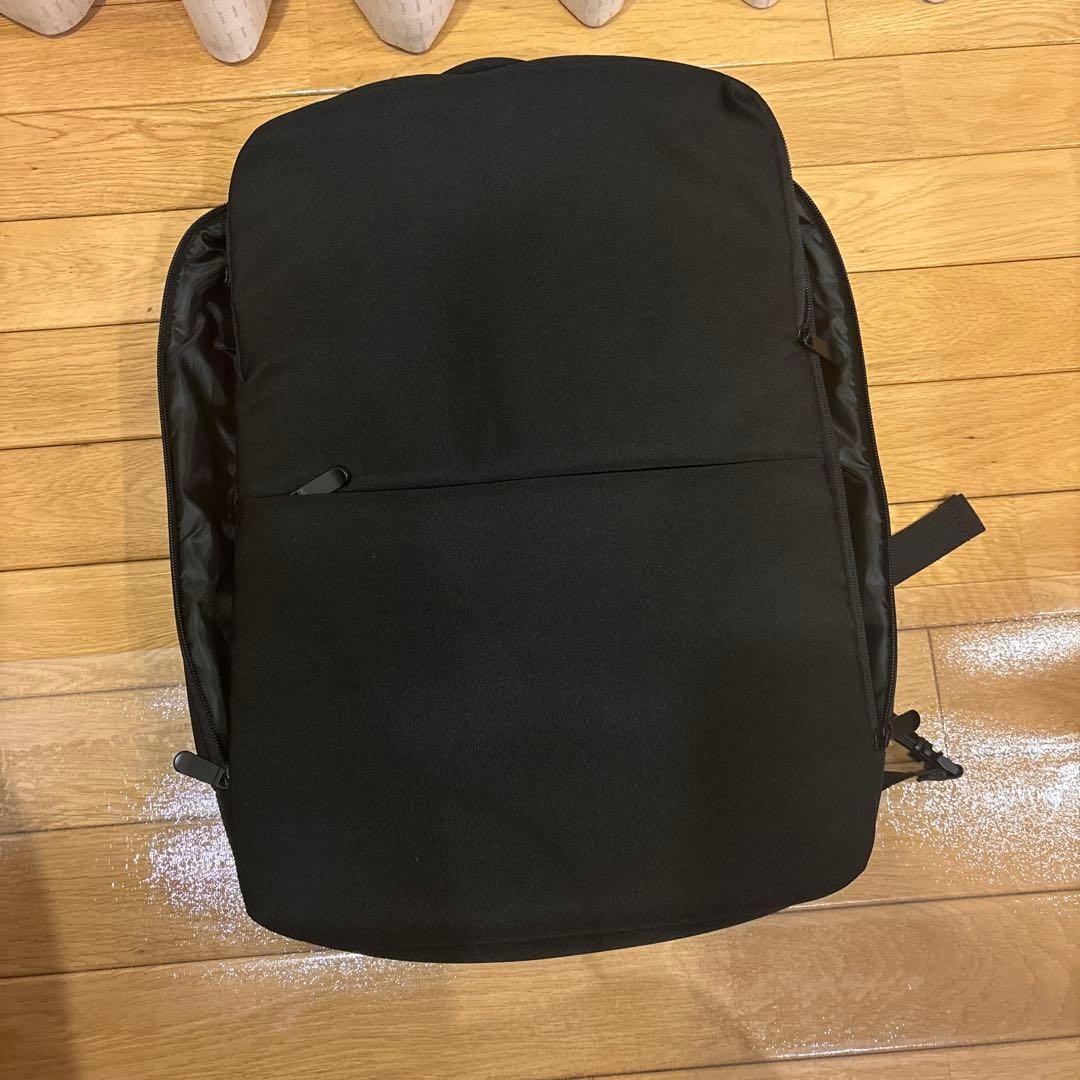 black backpack simple design - image 1