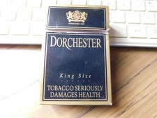 Paquete de cigarrillos Dorchester King Size dorado vacío lámina de plata c 2000
